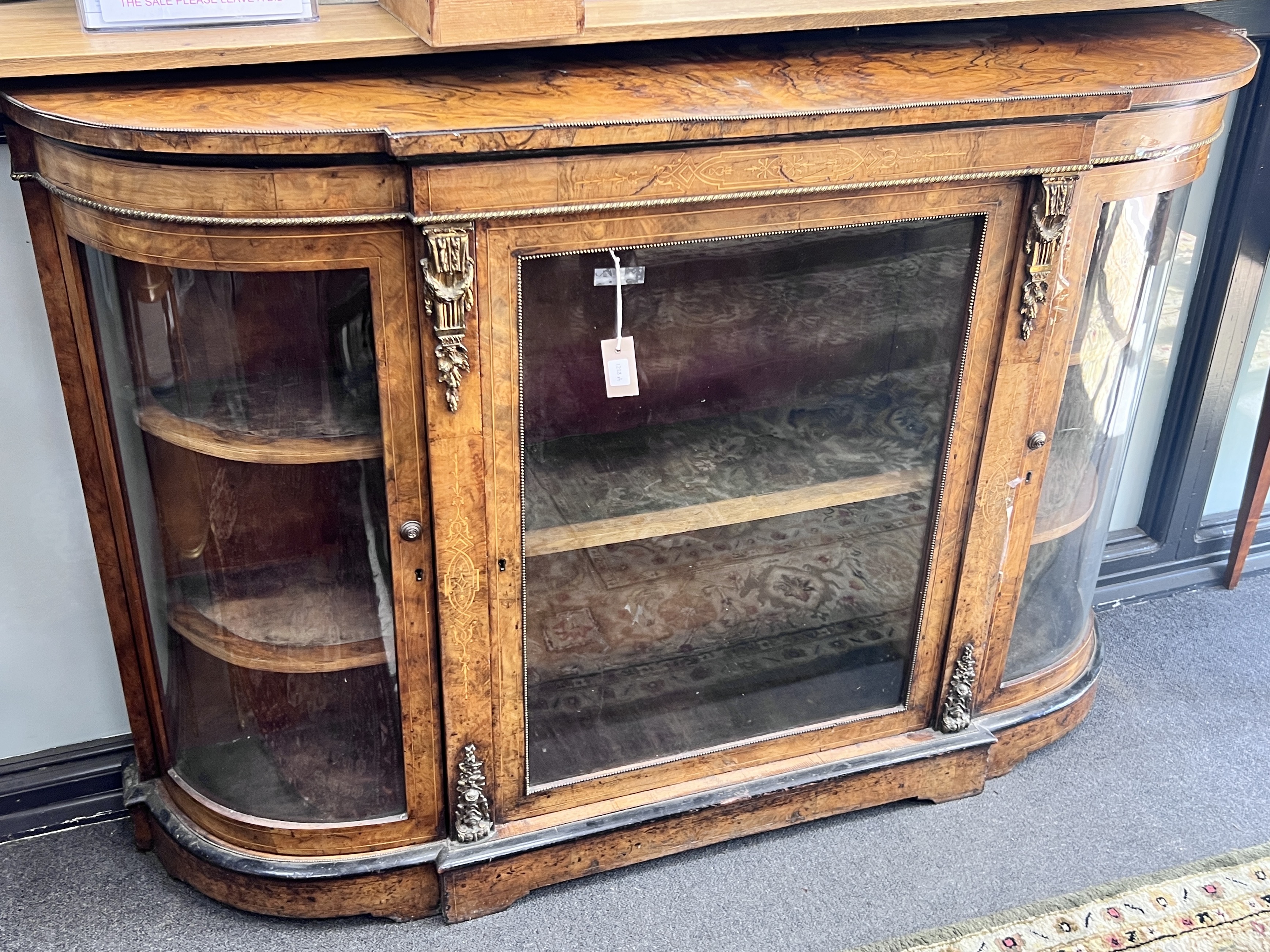 A Victorian walnut gilt metal mounted credenza, width 156cm, depth 35cm, height 102cm